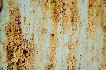 An old rusty metal wall. Beautiful texture for the background.