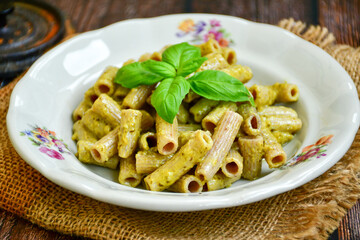   Gluten free Chickpea pasta.Fresh  low carb  high protein pasta rigatonia with   Pesto Genovese sauce  , parmesan cheese ,olive oil and black pepper) Ketogenic diet pasta
