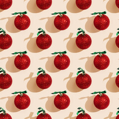 Happy holidays, Merry Christmas, New Year seamless pattern. Sparkling shiny red Christmas balls, new year design with shadows on pastel pink