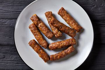 cevapcici, grilled balkan sausages on a plate