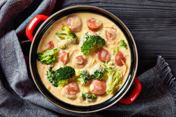 Broccoli Cheddar cheese Sausage Soup in a pot