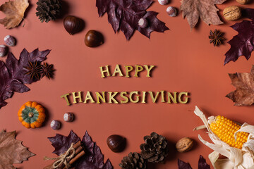 Autumn fall thanksgiving day composition with decorative dried leaves