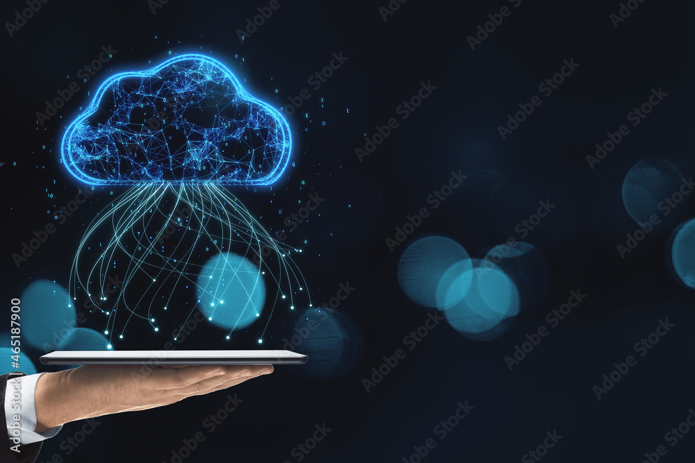 Poster Close up of hand holding tablet with glowing blue digital cloud with binary code on dark blurry bokeh background with mock up place. Computing and coding concept.