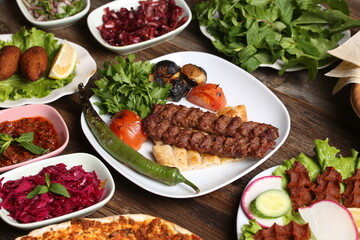 adana kebab and salad varieties