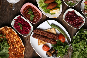 adana kebab and salad varieties