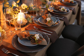 Fototapeta na wymiar Elegant table setting with beautiful floral decor
