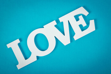 White wooden word love.