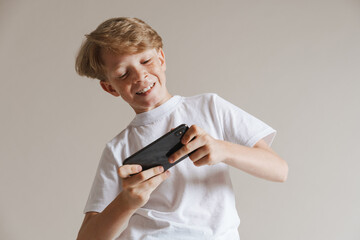 Portrait of a casual preteen boy in t-shirt standing