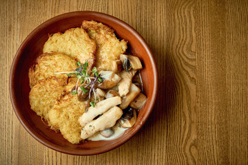 Fried potato pancakes with meat. Hashbrown, dranik