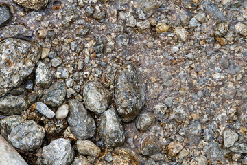 Granite stones texture in a stream