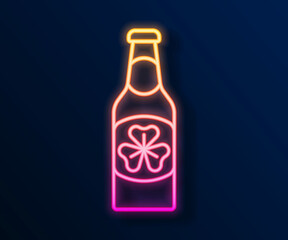 Glowing neon line Beer bottle with clover trefoil leaf icon isolated on black background. Happy Saint Patricks day. National Irish holiday. Vector