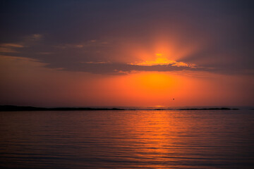 Fototapeta na wymiar Sunrise over the Caspian Sea. Beautiful cloudscape over the sea, sunrise shot
