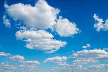 Obraz na płótnie Canvas White clouds in blue sky.