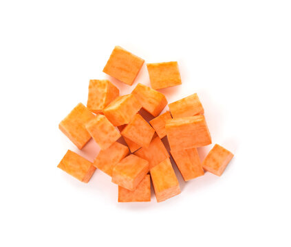 Heap of cut sweet potato on white background, top view