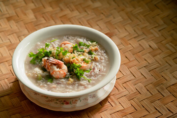 boiled rice clear soup with shrimp and green leafy vegetables