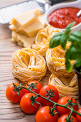 raw bolognese pasta with ingredients traditional italian recipe