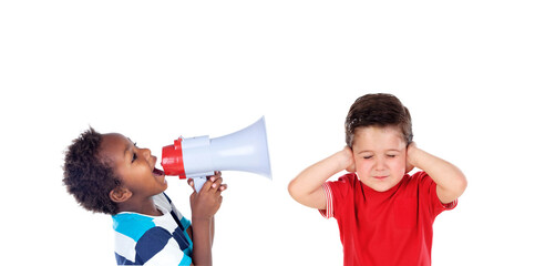 African child shouting with a megaphone and another little boy covering his ears