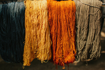 Full frame shot of colorful dyed yarn background. Colourful of dyed silk cotton from the natural colour.