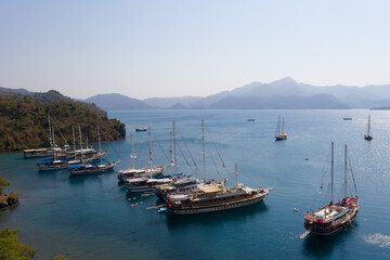 Fototapeta na wymiar Group of sailboats in mediterranean coast.