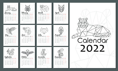 Vector calendar 2022 with tiger (symbol of new year) on cover. Week starts from Monday. Polygonal or origami animals. Set of 12 isolated months and cover. A4 format for print