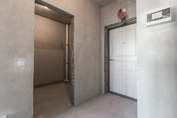 interior of the apartment without decoration in gray colors