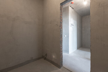 interior of the apartment without decoration in gray colors