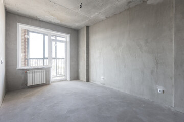 Obraz premium interior of the apartment without decoration in gray colors
