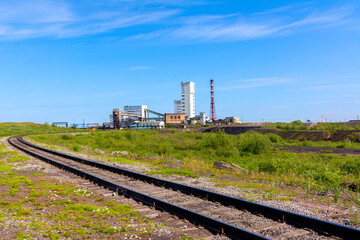 Fototapeta na wymiar Railway track leading to the mine. Komsomolsky, Vorkuta
