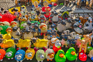 Bunch of plastic sheep and other animals in a street market, Germany