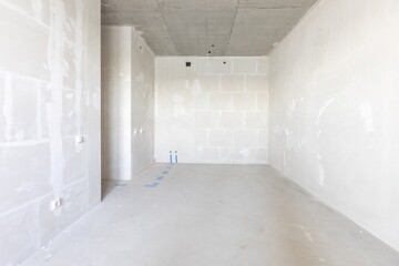 interior of the apartment without decoration in gray colors