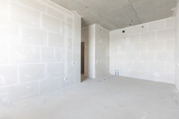 interior of the apartment without decoration in gray colors