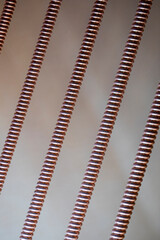 A close-up of strings of a grand piano that looks abstract