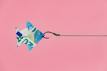 Origami money fish on hook