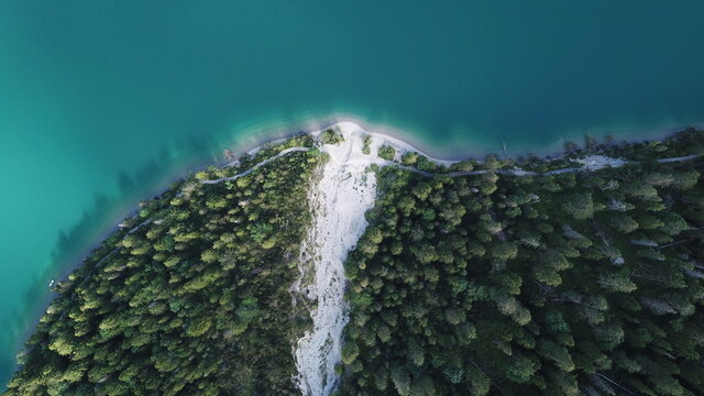 Aerial View Of Lake By Forest