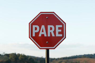 mandatory stop sign, in Portuguese PARE