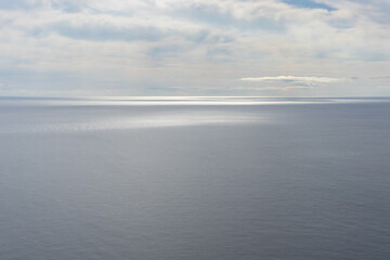 calm water of the Mediterranean sea and cloudy sky tranquility and meditation background 