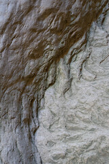 rough stone texture in a canyon ancient eroded rock formation abstract background