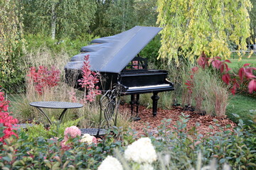 Piano iat autumn park or garden