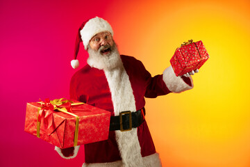 Portrait of happy smiling Santa Claus. Christmas celebration concept. Emotional face of Santa Clause in glasses.