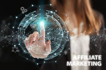 Business, Technology, Internet and network concept. Young businessman working on a virtual screen of the future and sees the inscription: Affiliate marketing