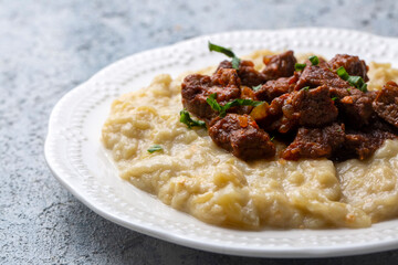Turkish Food Hunkar Begendi made with Eggplant and Meat.