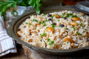 Traditional delicious Turkish food; Almond rice pilaf (Turkish name; Bademli pirinc pilavi)