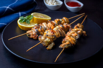 Fried mussels, delicious skewered mussels (Turkish name; midye tava, c&ouml;p sis midye)