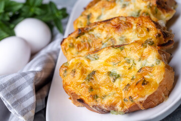 Turkish Egg Breads. It is called "Yumurtali Ekmek" in Turkish. French Toast. Turkish and Arabic Traditional Breakfast Baked or Fried Egg Bread. Egg bread with cheese and parsley.
