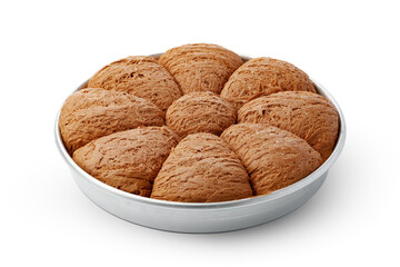 Turkish dessert halva in metal tray isolated on white