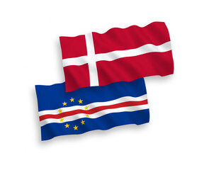 National vector fabric wave flags of Denmark and Republic of Cabo Verde isolated on white background. 1 to 2 proportion.
