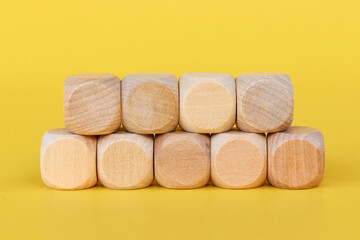 empty wooden cube on wood bacground, copy space