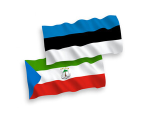 National vector fabric wave flags of Estonia and Republic of Equatorial Guinea isolated on white background. 1 to 2 proportion.