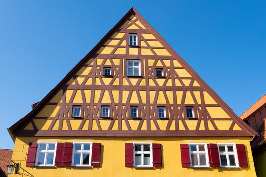 Germany, Bavaria, Dinkelsbuhl, Exterior of yellow painted half-timbered house