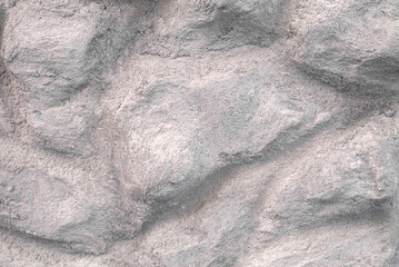 Naklejka premium Fragment of a light stone wall, masonry, copy space for text, mockup